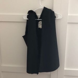 Dylan’s hooded fur vest